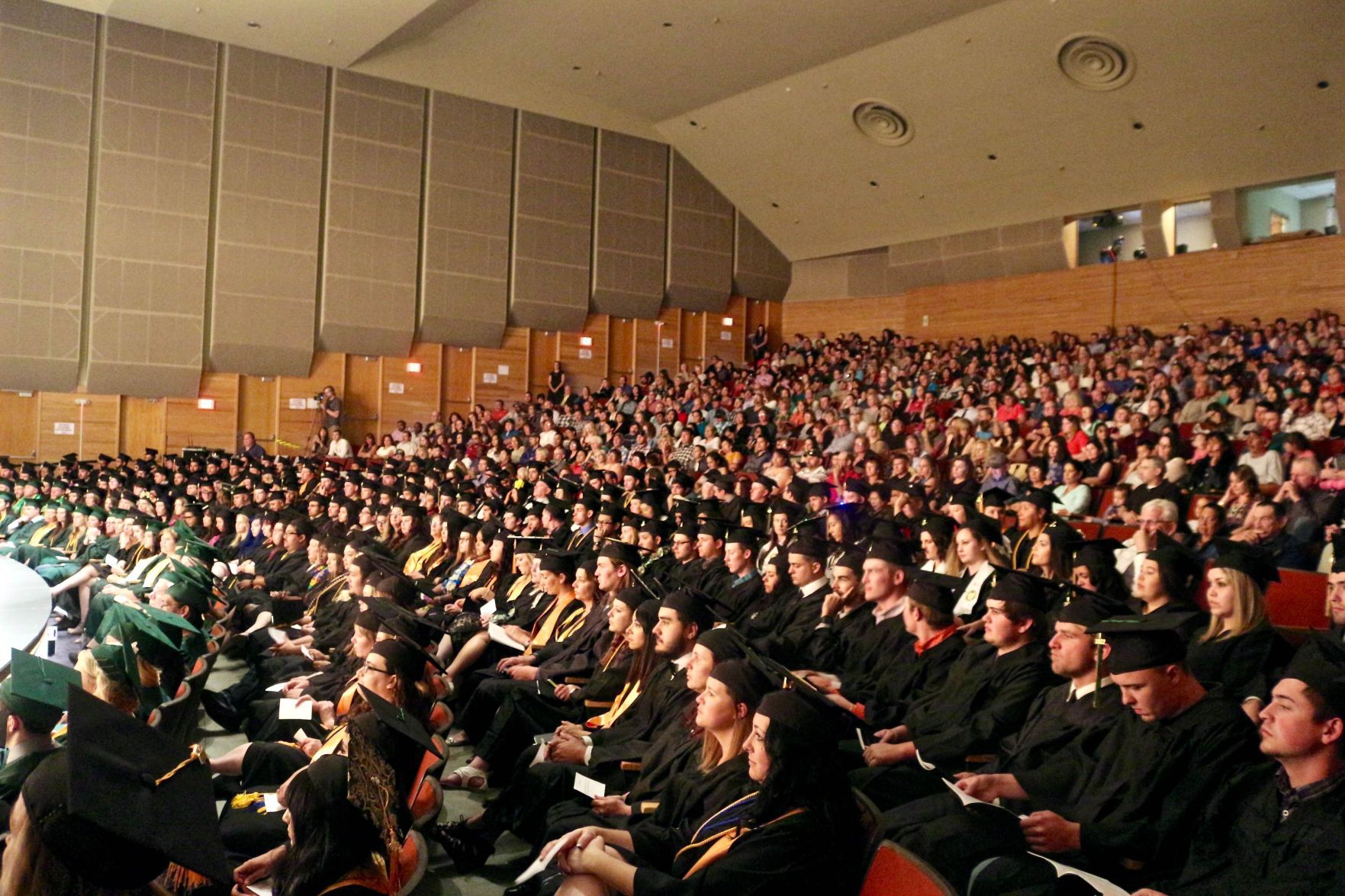 Elko Convention Center auditorium graduates and audience.jpg